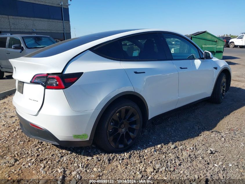 2023 Tesla Model Y Awd/Long Range Dual Motor All-Wheel Drive VIN: 7SAYGDEE6PF588608 Lot: 40595123