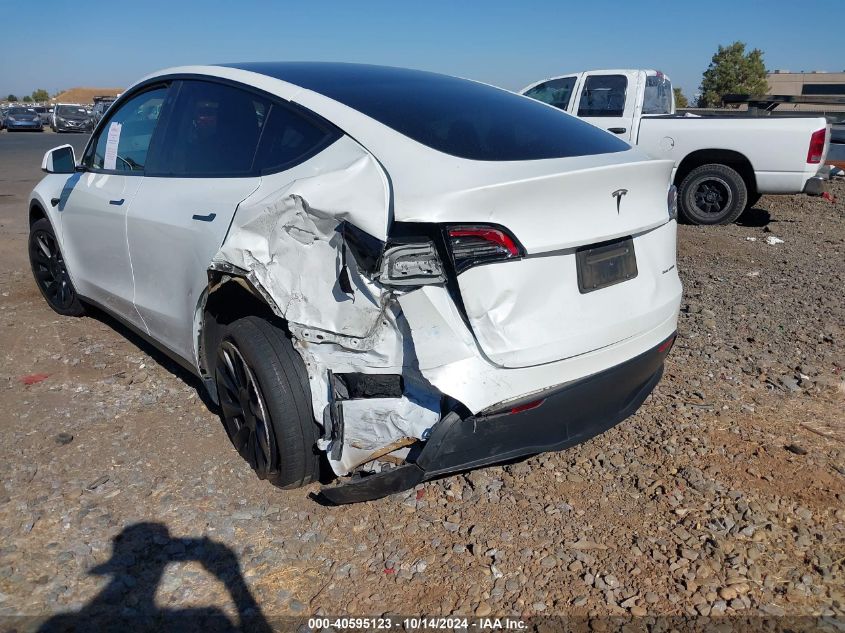 2023 Tesla Model Y Awd/Long Range Dual Motor All-Wheel Drive VIN: 7SAYGDEE6PF588608 Lot: 40595123