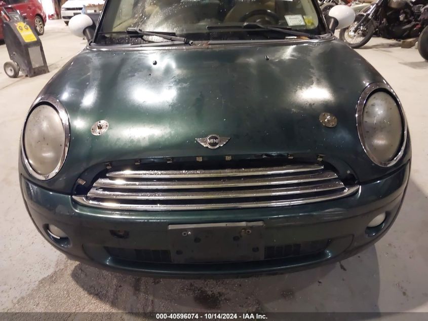 2007 Mini Cooper VIN: WMWMF335X7TT50525 Lot: 40596074