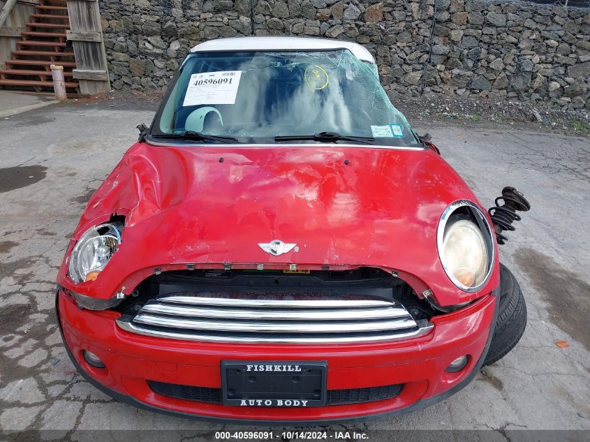 2009 Mini Cooper VIN: WMWMF33539TU70301 Lot: 40596091