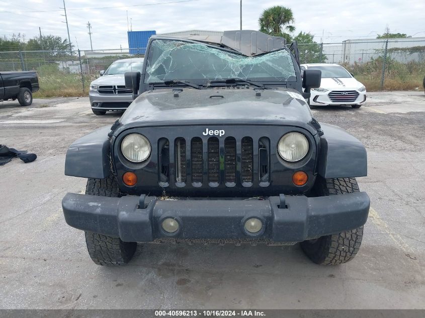 2007 Jeep Wrangler Sahara VIN: 1J4FA54127L198218 Lot: 40596213