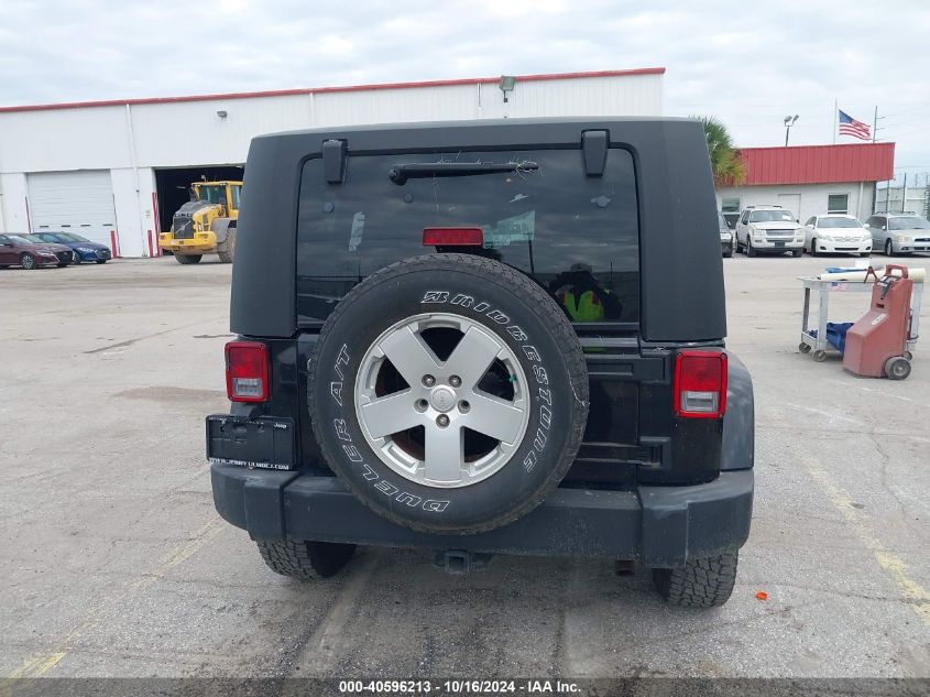 2007 Jeep Wrangler Sahara VIN: 1J4FA54127L198218 Lot: 40596213