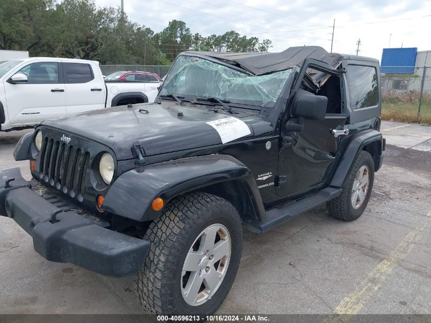 2007 Jeep Wrangler Sahara VIN: 1J4FA54127L198218 Lot: 40596213