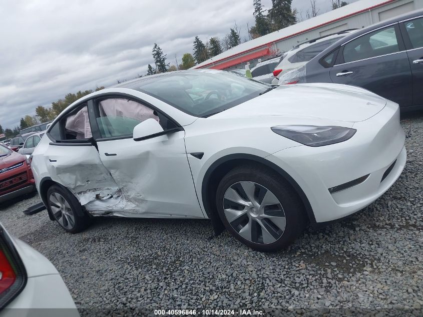 2023 Tesla Model Y Awd/Long Range Dual Motor All-Wheel Drive VIN: 7SAYGDEE0PF814691 Lot: 40596846