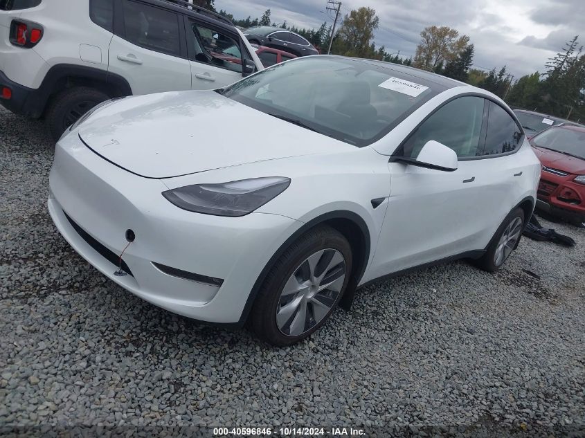 2023 Tesla Model Y Awd/Long Range Dual Motor All-Wheel Drive VIN: 7SAYGDEE0PF814691 Lot: 40596846