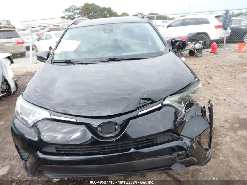 2018 Toyota Rav4 Le VIN: 2T3ZFREV7JW496054 Lot: 40597710