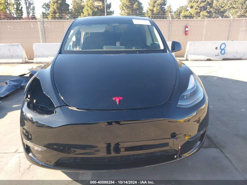 2024 Tesla Model Y Long Range Dual Motor All-Wheel Drive VIN: 7SAYGDEE5RF982457 Lot: 40598284