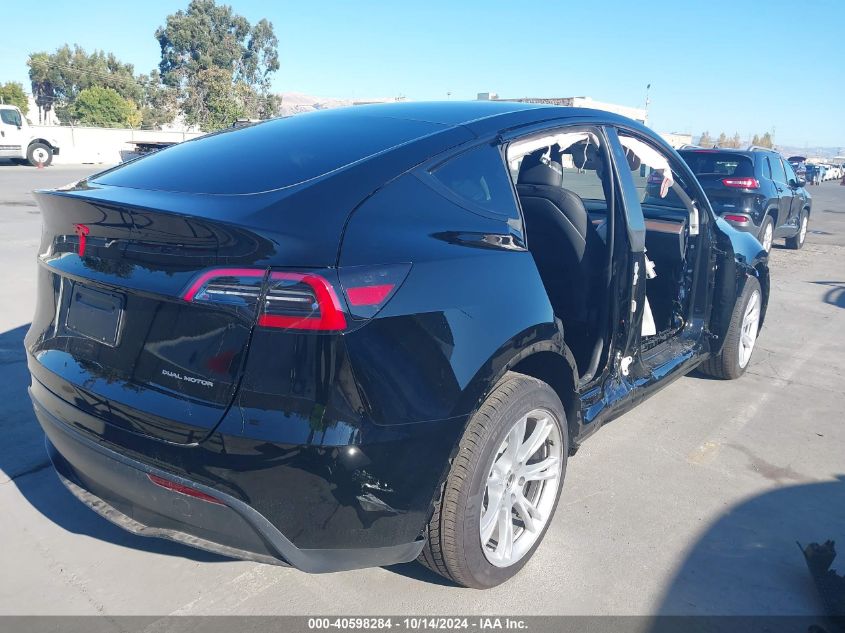 2024 Tesla Model Y Long Range Dual Motor All-Wheel Drive VIN: 7SAYGDEE5RF982457 Lot: 40598284