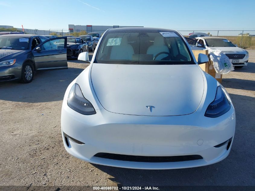 2024 Tesla Model Y Long Range Dual Motor All-Wheel Drive/Rwd VIN: 7SAYGDED5RA310807 Lot: 40598702