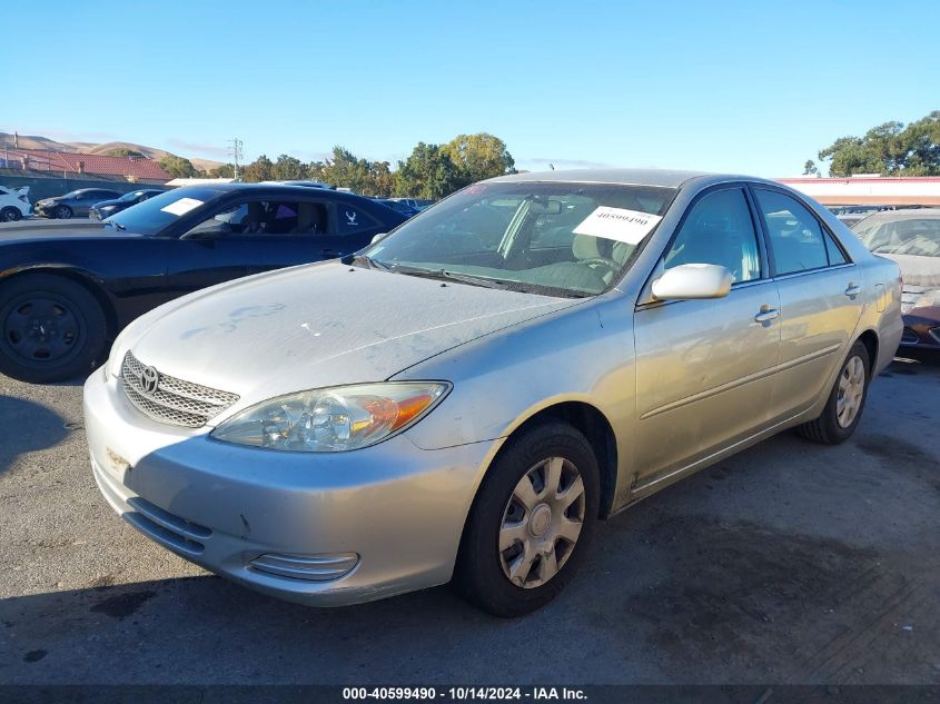 2003 Toyota Camry Le VIN: JTDBE32K830167284 Lot: 40599490