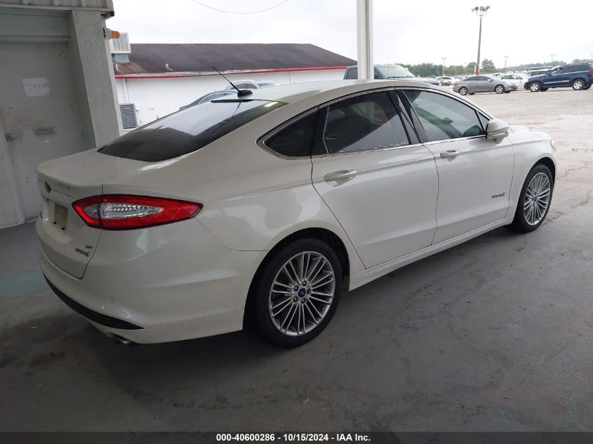 VIN 5N1AT2MT6GC914317 2014 FORD FUSION HYBRID no.4