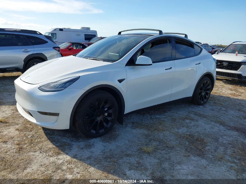 2023 Tesla Model Y Awd/Long Range Dual Motor All-Wheel Drive VIN: 7SAYGDEE2PA024869 Lot: 40600981