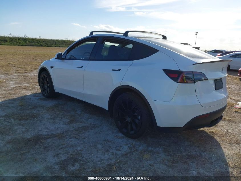 2023 Tesla Model Y Awd/Long Range Dual Motor All-Wheel Drive VIN: 7SAYGDEE2PA024869 Lot: 40600981