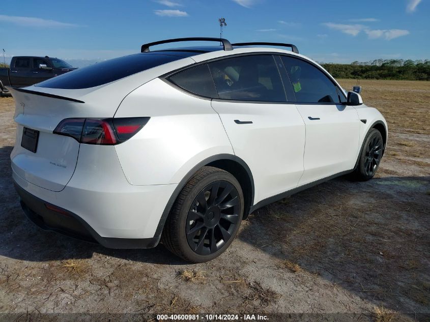 2023 Tesla Model Y Awd/Long Range Dual Motor All-Wheel Drive VIN: 7SAYGDEE2PA024869 Lot: 40600981