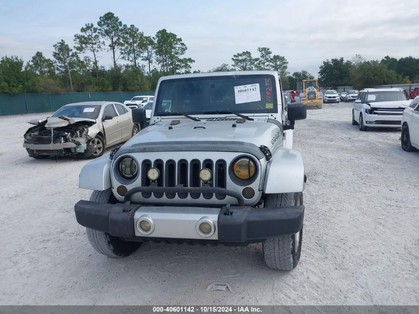 2009 Jeep Wrangler Sahara VIN: 1J4FA54109L766565 Lot: 40601142