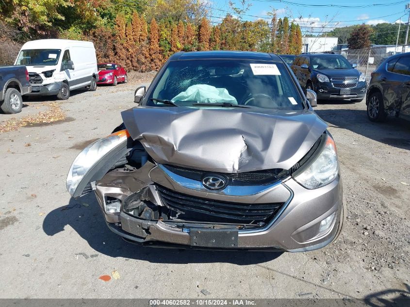 2012 Hyundai Tucson Limited VIN: KM8JUCACXCU375891 Lot: 40602582