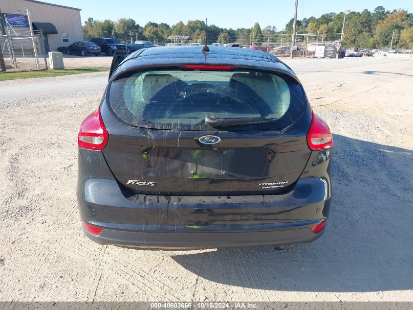 2015 Ford Focus Titanium VIN: 1FADP3N25FL311543 Lot: 40603666