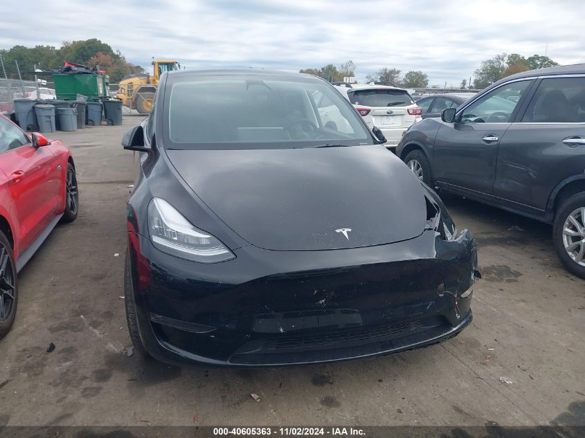 2023 Tesla Model Y Awd/Long Range Dual Motor All-Wheel Drive VIN: 7SAYGDEE2PA110540 Lot: 40605363