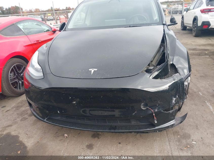 2023 Tesla Model Y Awd/Long Range Dual Motor All-Wheel Drive VIN: 7SAYGDEE2PA110540 Lot: 40605363