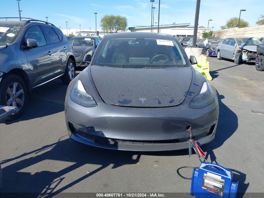 2022 Tesla Model 3 Long Range Dual Motor All-Wheel Drive VIN: 5YJ3E1EB0NF228569 Lot: 40607761