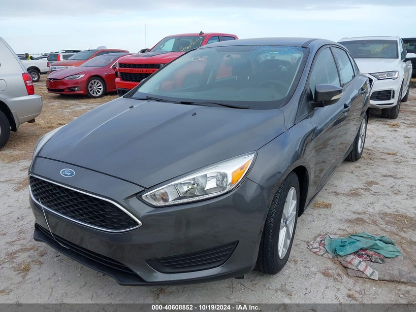VIN 1FADP3FE5HL338110 2017 FORD FOCUS SE