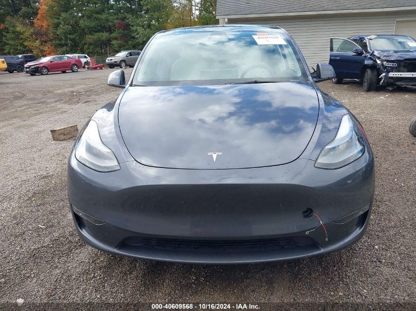 2023 Tesla Model Y Awd/Long Range Dual Motor All-Wheel Drive VIN: 7SAYGDEE7PA172421 Lot: 40609568