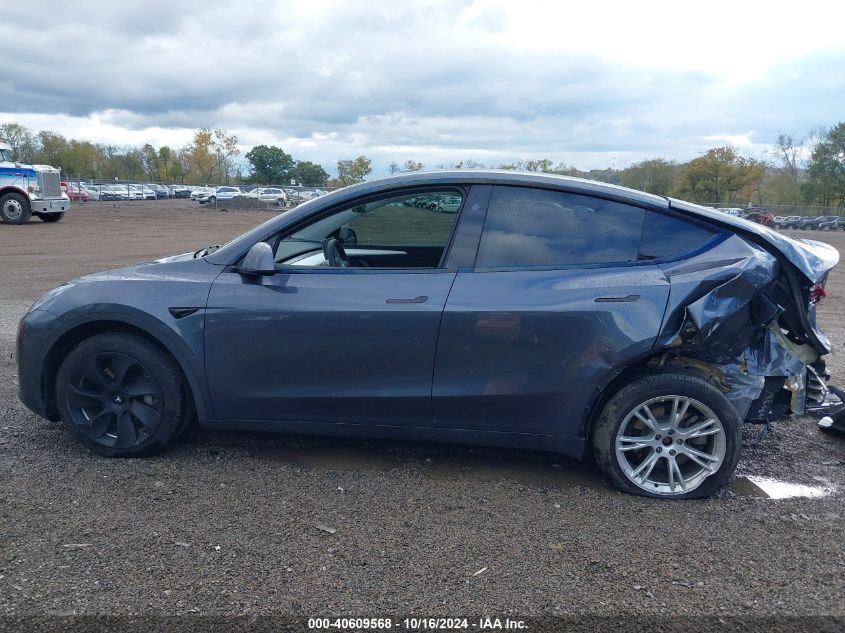 2023 Tesla Model Y Awd/Long Range Dual Motor All-Wheel Drive VIN: 7SAYGDEE7PA172421 Lot: 40609568