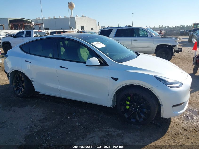 2023 Tesla Model Y VIN: 7SAYGDEE5PA148019 Lot: 40610683