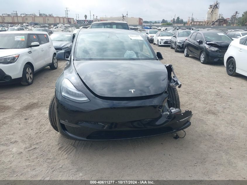 2024 Tesla Model Y VIN: 7SAYGDEF1RF163776 Lot: 40611277