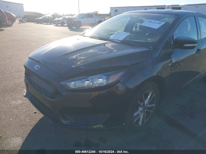 2016 Ford Focus Se VIN: 1FADP3F23GL317860 Lot: 40612240