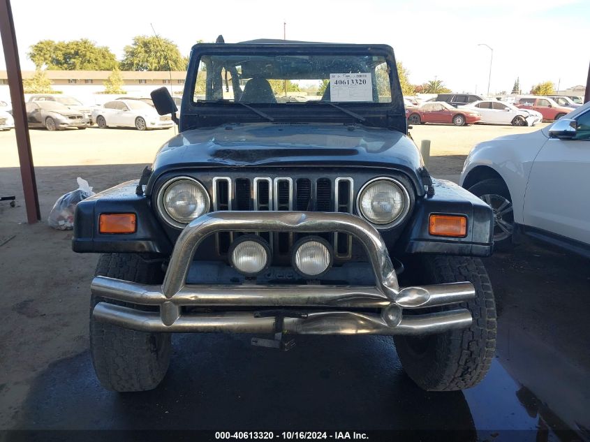 2001 Jeep Wrangler Sport VIN: 1J4FA49SX1P344201 Lot: 40613320