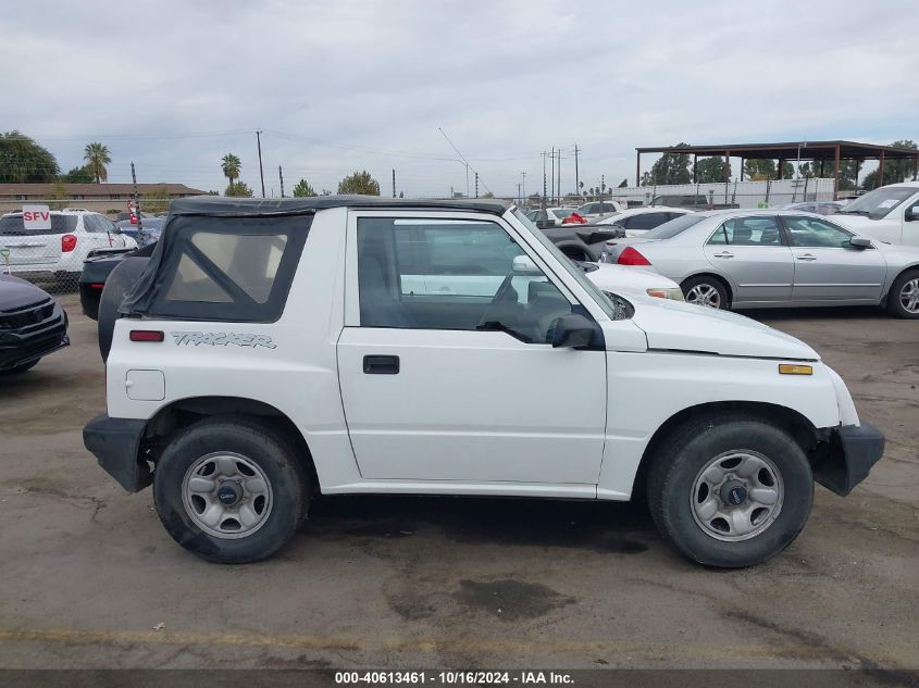 1997 Geo Tracker Softtop VIN: 2CNBE1860V6910380 Lot: 40613461