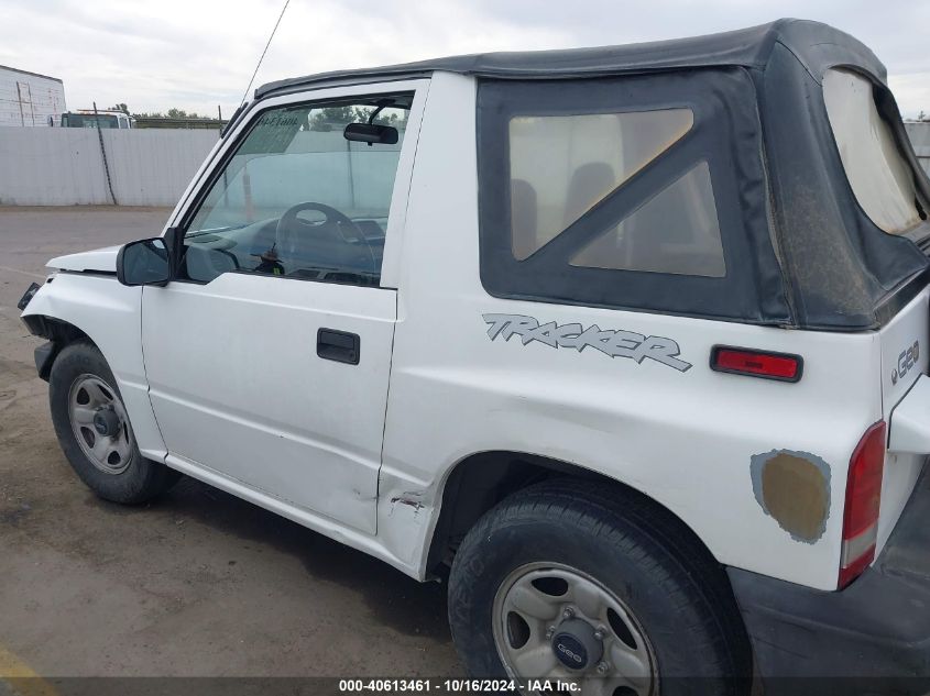 1997 Geo Tracker Softtop VIN: 2CNBE1860V6910380 Lot: 40613461