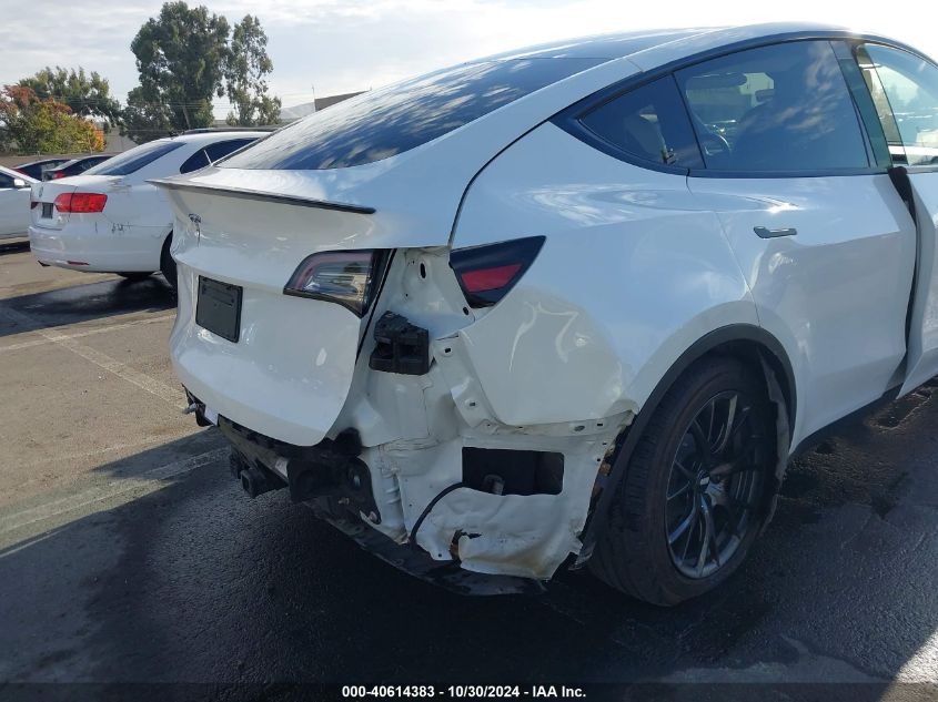 2020 Tesla Model Y Long Range Dual Motor All-Wheel Drive/Performance Dual Motor All-Wheel Drive VIN: 5YJYGDEF3LF023104 Lot: 40614383