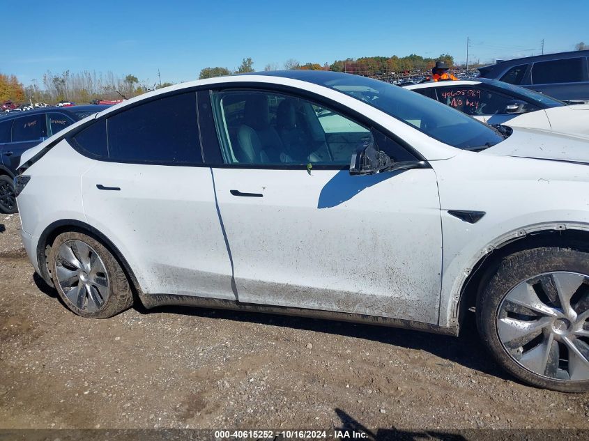 2023 Tesla Model Y Awd/Long Range Dual Motor All-Wheel Drive VIN: 7SAYGDEE4PF618866 Lot: 40615252