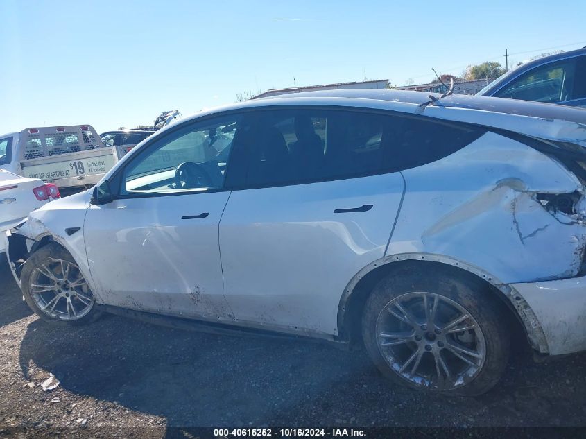 2023 Tesla Model Y Awd/Long Range Dual Motor All-Wheel Drive VIN: 7SAYGDEE4PF618866 Lot: 40615252