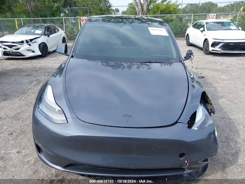 2023 Tesla Model Y Awd/Long Range Dual Motor All-Wheel Drive VIN: 7SAYGDEE0PA203170 Lot: 40618103