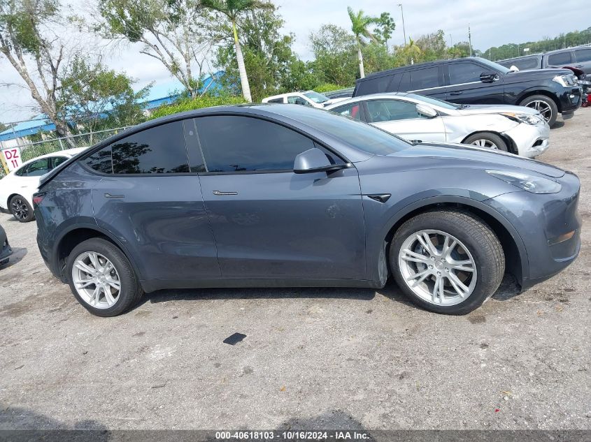 2023 Tesla Model Y Awd/Long Range Dual Motor All-Wheel Drive VIN: 7SAYGDEE0PA203170 Lot: 40618103