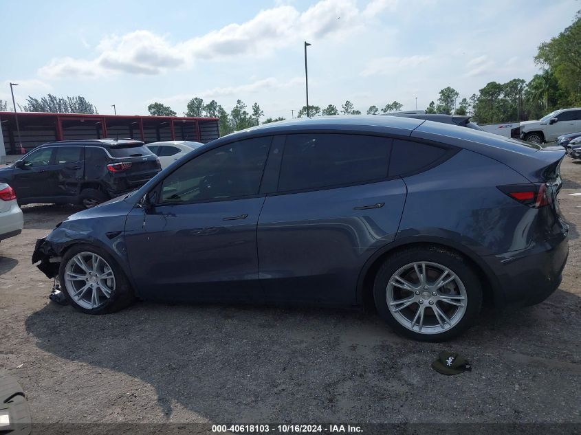 2023 Tesla Model Y Awd/Long Range Dual Motor All-Wheel Drive VIN: 7SAYGDEE0PA203170 Lot: 40618103