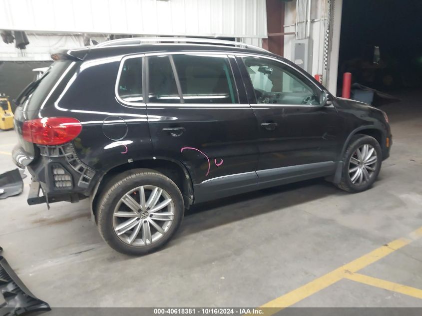 2014 Volkswagen Tiguan Sel VIN: WVGBV3AX1EW565543 Lot: 40618381