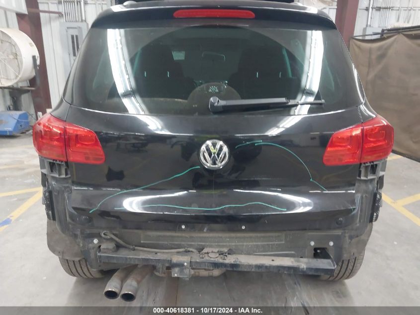 2014 Volkswagen Tiguan Sel VIN: WVGBV3AX1EW565543 Lot: 40618381