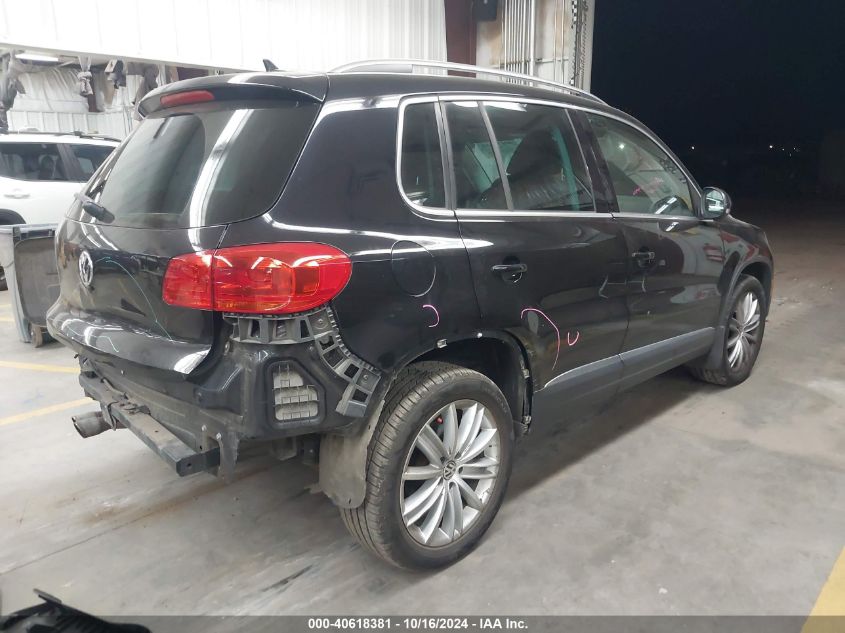 2014 Volkswagen Tiguan Sel VIN: WVGBV3AX1EW565543 Lot: 40618381