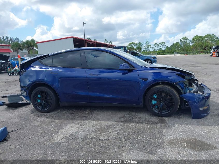 2023 Tesla Model Y Awd/Long Range Dual Motor All-Wheel Drive VIN: 7SAYGAEE4PF701471 Lot: 40619350