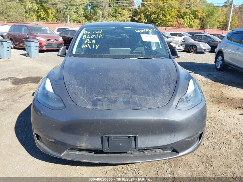 2023 Tesla Model Y Awd/Long Range Dual Motor All-Wheel Drive VIN: 7SAYGDEE0PF949427 Lot: 40620655