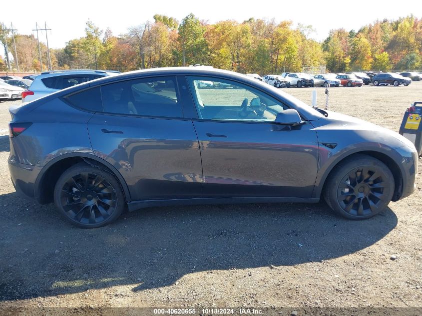 2023 Tesla Model Y Awd/Long Range Dual Motor All-Wheel Drive VIN: 7SAYGDEE0PF949427 Lot: 40620655