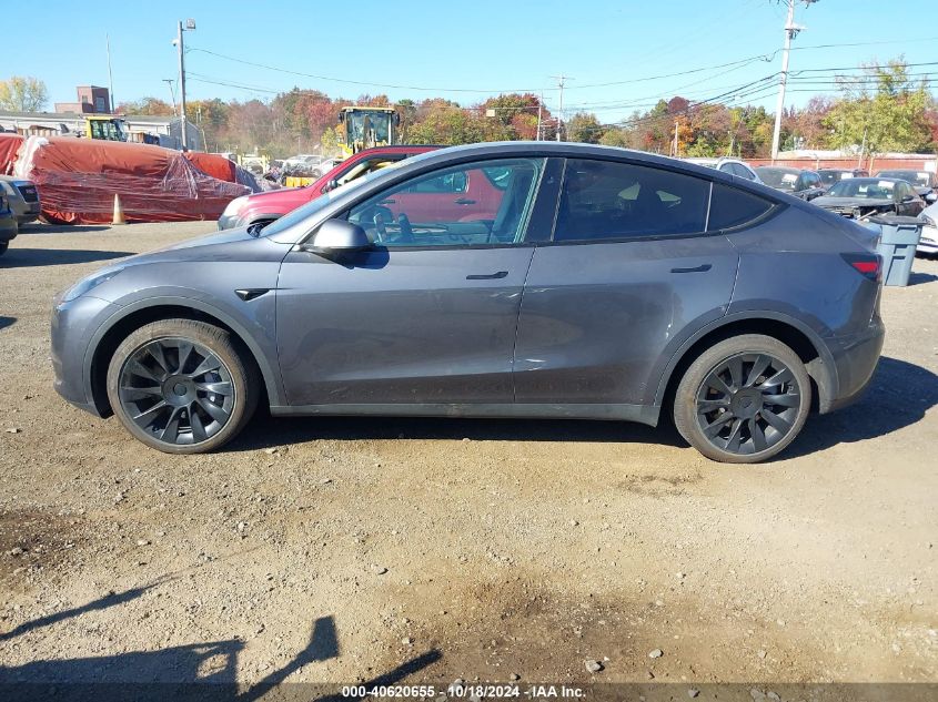 2023 Tesla Model Y Awd/Long Range Dual Motor All-Wheel Drive VIN: 7SAYGDEE0PF949427 Lot: 40620655