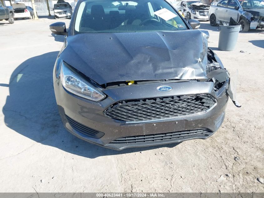 2016 Ford Focus Se VIN: 1FADP3F2XGL394175 Lot: 40623441