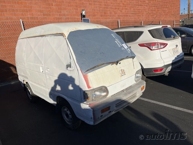 1999 Kia An240 Microvan VIN: KN3HNS8D2WK081205 Lot: 40625858