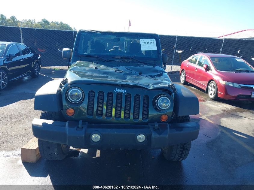 2011 Jeep Wrangler Sport VIN: 1J4AA2D10BL510618 Lot: 40628162