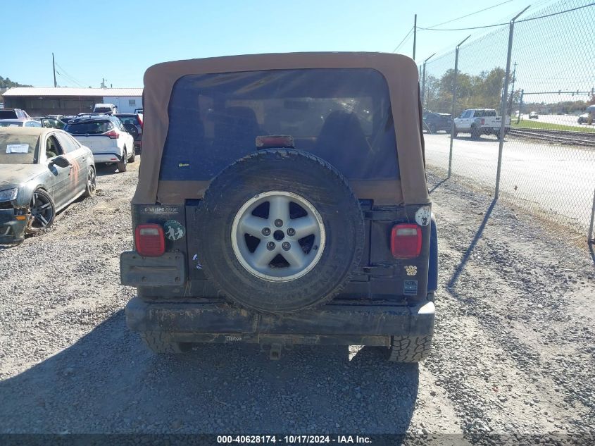 2000 Jeep Wrangler Sport VIN: 1J4FA49S1YP703915 Lot: 40628174